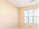 Cozy bedroom with natural light, neutral paint, and carpet flooring at 1378 Penhurst Dr, Lawrenceville, GA 30043
