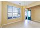 Inviting dining room with tile flooring, neutral paint, and natural light from a window at 1378 Penhurst Dr, Lawrenceville, GA 30043