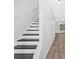 View of staircase and doorway leading to the living space with wood-look flooring at 1573 Eastern Sunrise Ln, Decatur, GA 30034