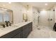 Bright bathroom features marble counters, soaking tub, and a frameless shower at 1993 Mount Vernon Pl, Dunwoody, GA 30338