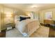 Bright bedroom features neutral colors, hardwood floors, and ensuite bathroom access at 1993 Mount Vernon Pl, Dunwoody, GA 30338