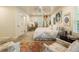 Bright bedroom featuring carpet, 2 windows, and coastal-themed decor at 1993 Mount Vernon Pl, Dunwoody, GA 30338
