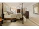 Bedroom featuring a four-poster bed and neutral decor at 1993 Mount Vernon Pl, Dunwoody, GA 30338