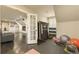 View of exercise room leading into the bonus room with built-ins and theater seating at 1993 Mount Vernon Pl, Dunwoody, GA 30338