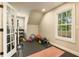 Exercise room with hardwood flooring, bright window and workout equipment at 1993 Mount Vernon Pl, Dunwoody, GA 30338