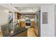 Functional kitchen with stainless steel appliances, granite countertops and wood cabinets at 325 Upper Creek Ct, Roswell, GA 30076