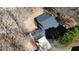 Aerial view of the home featuring its roofline, driveway, and surrounding trees at 359 Cannongate Rd, Sharpsburg, GA 30277