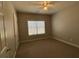 Bedroom with carpet, a ceiling fan, and natural light from the window at 359 Cannongate Rd, Sharpsburg, GA 30277