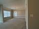 Dining Room with carpet, a chandelier, and natural light from the windows at 359 Cannongate Rd, Sharpsburg, GA 30277