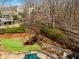 The backyard has stone terracing, a waterfall and an inviting green lawn at 4170 Summit Way, Marietta, GA 30066