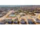 Aerial view of the community with mature trees, showcasing the pool and tennis courts at 4645 Dandelion Way, Cumming, GA 30040