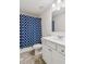 Stylish bathroom with a classic blue patterned shower curtain and a modern vanity at 4645 Dandelion Way, Cumming, GA 30040