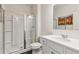 Updated bathroom features a shower and vanity with a single sink at 4645 Dandelion Way, Cumming, GA 30040