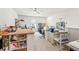 Large bonus room has bright walls, ceiling fan, and plenty of space to work at 4645 Dandelion Way, Cumming, GA 30040