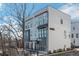 Modern townhome with a mix of dark framed windows and blue and gray siding at 728 Se Eloise Se Way, Atlanta, GA 30312