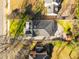 An aerial view shows the rooftop of a home with mature trees and a grassy lawn on a sunny day at 1337 M L King Jr Nw Dr, Atlanta, GA 30314