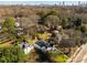An aerial view showcases the Atlanta skyline with mature trees and beautiful neighborhood homes at 1337 M L King Jr Nw Dr, Atlanta, GA 30314