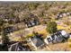 An aerial view shows the home in a neighborhood setting with mature trees and beautiful lawns at 1337 M L King Jr Nw Dr, Atlanta, GA 30314