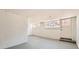 Unfinished basement with concrete floor and white painted walls at 1337 M L King Jr Nw Dr, Atlanta, GA 30314