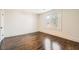 Bedroom with hardwood floors and lots of natural light from the double windows at 1337 M L King Jr Nw Dr, Atlanta, GA 30314