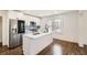 Modern kitchen with stainless steel appliances, white cabinetry, and a center island at 1337 M L King Jr Nw Dr, Atlanta, GA 30314