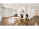 Elegant living room with hardwood floors, fireplace, and coffered ceiling at 1337 M L King Jr Nw Dr, Atlanta, GA 30314