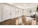 Stylish living room featuring hardwood floors, a fireplace, and archway at 1337 M L King Jr Nw Dr, Atlanta, GA 30314