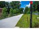 Martin Luther King Jr. Drive SW sign next to a well maintained walking path with lush greenery at 1337 M L King Jr Nw Dr, Atlanta, GA 30314