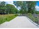 A beautifully landscaped pedestrian bridge and walking path lined with lush greenery, perfect for a stroll at 1337 M L King Jr Nw Dr, Atlanta, GA 30314
