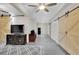 Finished basement featuring barn doors, recessed lighting, and wood-look ceiling at 2075 Pine Tree Dr, Buford, GA 30518