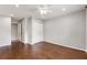 Bedroom featuring hardwood floors, a ceiling fan, and closet at 330 Chaffin Ridge Ct, Roswell, GA 30075