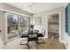 Sun-drenched breakfast area with sliding glass doors to the back deck at 330 Chaffin Ridge Ct, Roswell, GA 30075