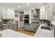 Well-equipped kitchen featuring stainless steel appliances and white cabinets at 330 Chaffin Ridge Ct, Roswell, GA 30075