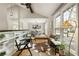 Sun-filled living room with vaulted ceilings, hardwood floors, large windows, and stylish decor at 330 Chaffin Ridge Ct, Roswell, GA 30075
