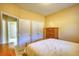 Bedroom showcasing a dresser, closet, and a view to another room at 75 Horseshoe Dr, Covington, GA 30014