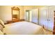 Bedroom featuring double closets and a wooden dresser at 75 Horseshoe Dr, Covington, GA 30014