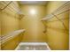 Walk-in closet with carpet, bright lighting, and ample wire shelving for storage at 75 Horseshoe Dr, Covington, GA 30014