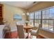 Inviting dining area with table set, chairs, and a view to the outside at 75 Horseshoe Dr, Covington, GA 30014