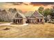 Beautiful brick home with well-manicured lawn and inviting entrance, perfect for a Gathering at 75 Horseshoe Dr, Covington, GA 30014