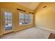 Living room with a large window and door to the backyard at 75 Horseshoe Dr, Covington, GA 30014