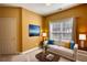 Comfortable living room with white sofa, modern decor, and a large window offering ample natural light at 75 Horseshoe Dr, Covington, GA 30014