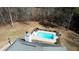 Aerial view of a rectangular in-ground pool and the surrounding yard at 75 Horseshoe Dr, Covington, GA 30014