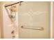 Shower stall equipped with a sliding door and a convenient storage rack at 75 Horseshoe Dr, Covington, GA 30014