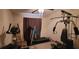 Exercise room featuring a treadmill, exercise bike, and multi-gym equipment at 903 Tucker Ln, Loganville, GA 30052