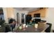 Functional kitchen with black appliances, ample counter space, and light wood cabinets at 903 Tucker Ln, Loganville, GA 30052