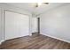 Bedroom features wood-look flooring and neutral paint at 505 S Malton S Ct, Stone Mountain, GA 30083