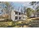 Well-maintained two-story home with mature trees in a serene setting, offering curb appeal at 505 S Malton S Ct, Stone Mountain, GA 30083