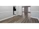 Inviting living room featuring stylish floors and natural light from large windows at 505 S Malton S Ct, Stone Mountain, GA 30083