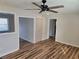 Bedroom featuring wood-look flooring, neutral walls, and a double closet at 938 Rebel Forest Se Dr, Atlanta, GA 30315