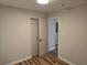 Bedroom with a closet and new hardwood floors at 938 Rebel Forest Se Dr, Atlanta, GA 30315